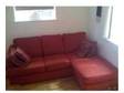 Large red sofa with chaise longue. Three-year old large....
